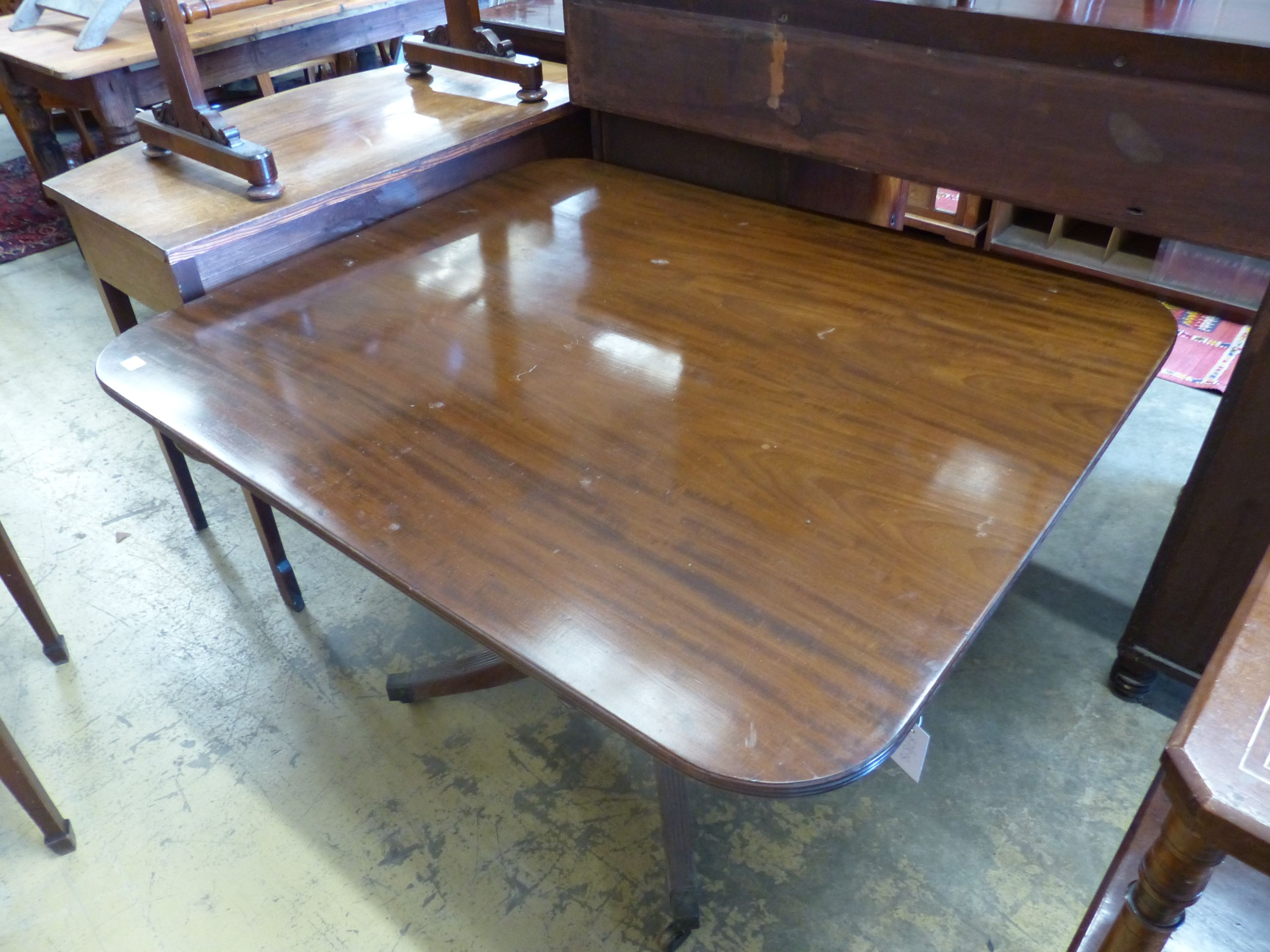 A George III design rectangular mahogany tilt top breakfast table, length 118cm, width 100cm, height 70cm